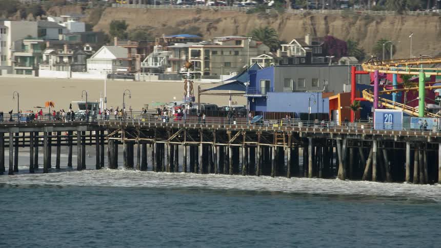 The piers are busy with many people walking around