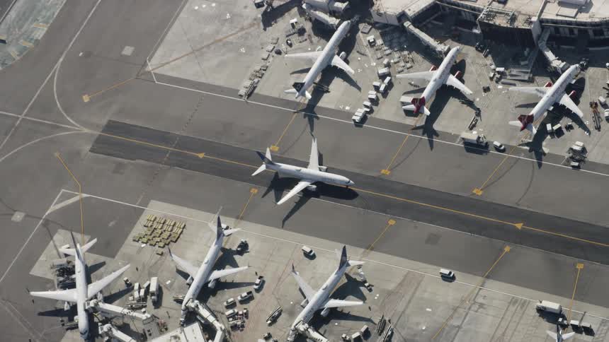 A jet drives on a airport tarmac