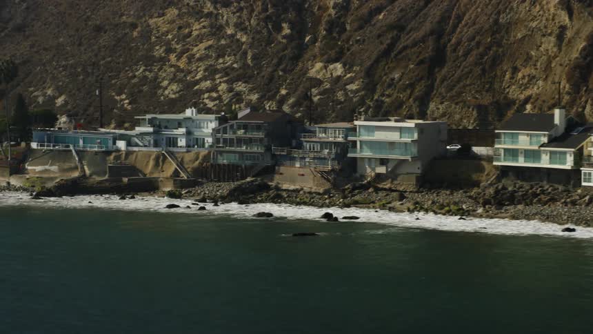 Houses sits on a beach