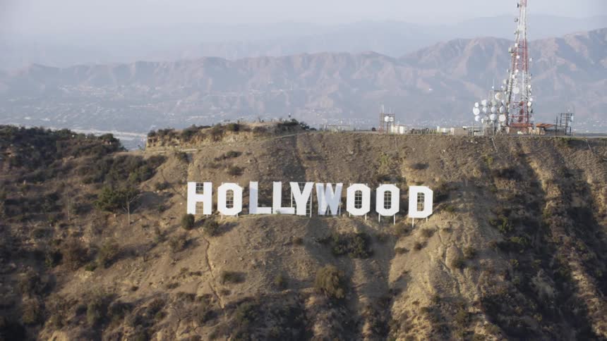 The hollywood sign on the hill is all white