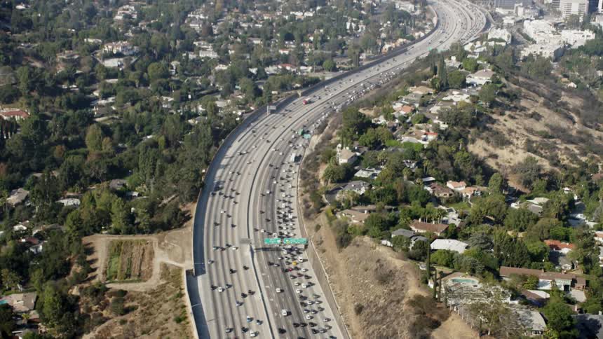 Cars travel on a highway