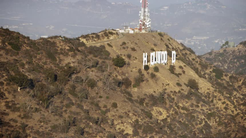 The tall hills have a large sign reading hollywood