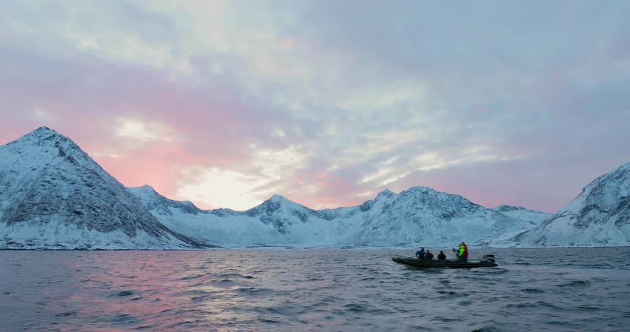 A boat travels on antarctic waters