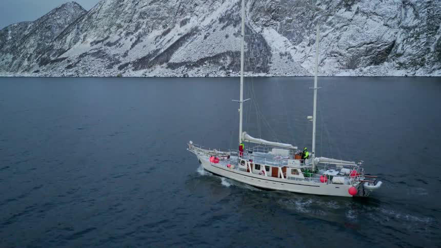 Boat travels on the open water