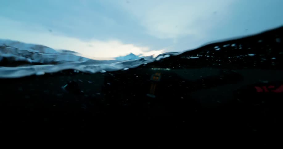 A snorkeler swims in the ocean