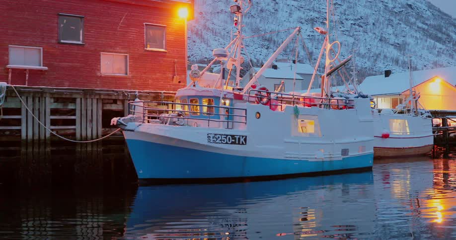 A boat is tethered to a dock