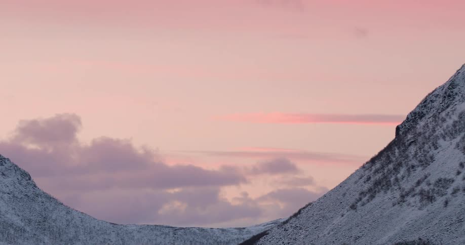 Snow and ice cover the mountains