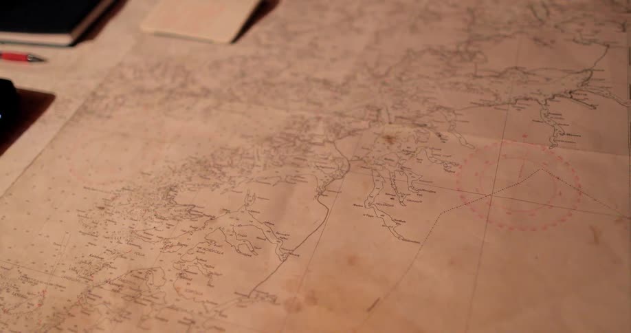 A map sits atop a table