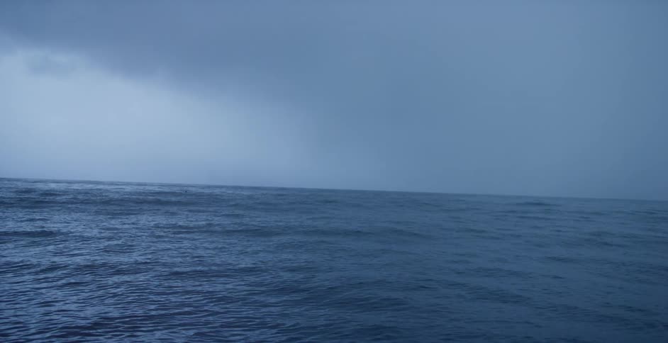 Boat on the sea on a very cloudy day