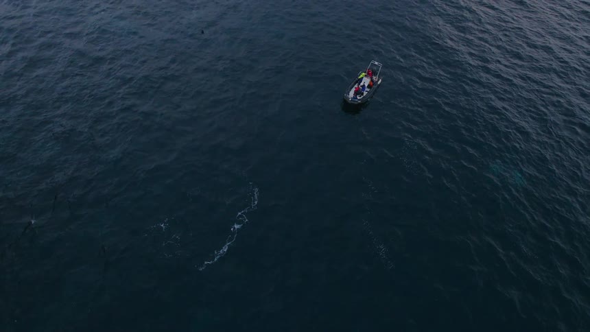 Small raft floats in the open water