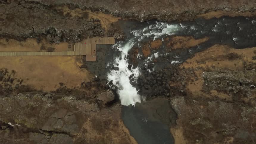 A river flows over a cliff