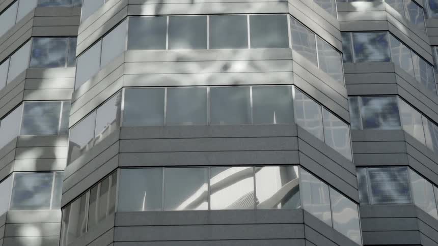 Windows cover a tall building