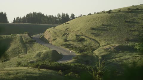 A grassy hill top