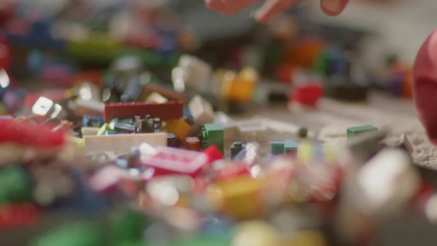 A child plays with toy building blocks