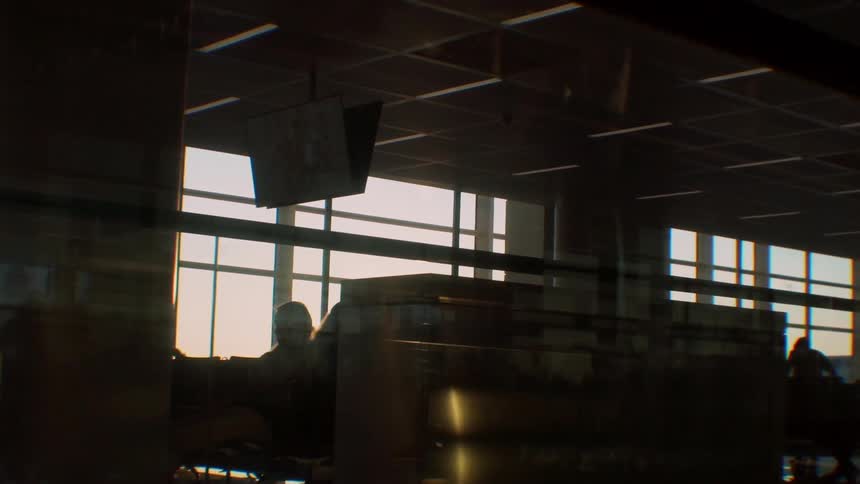 People sitting in an airport waiting area