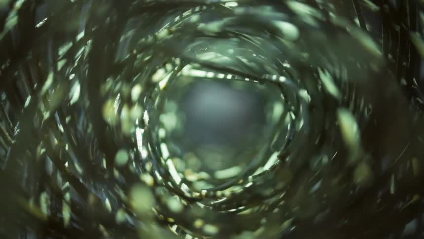 Light filters through a wicker cone