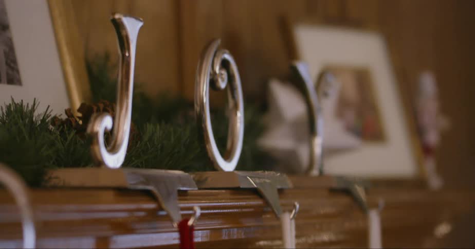 A mantel is decorated for christmas
