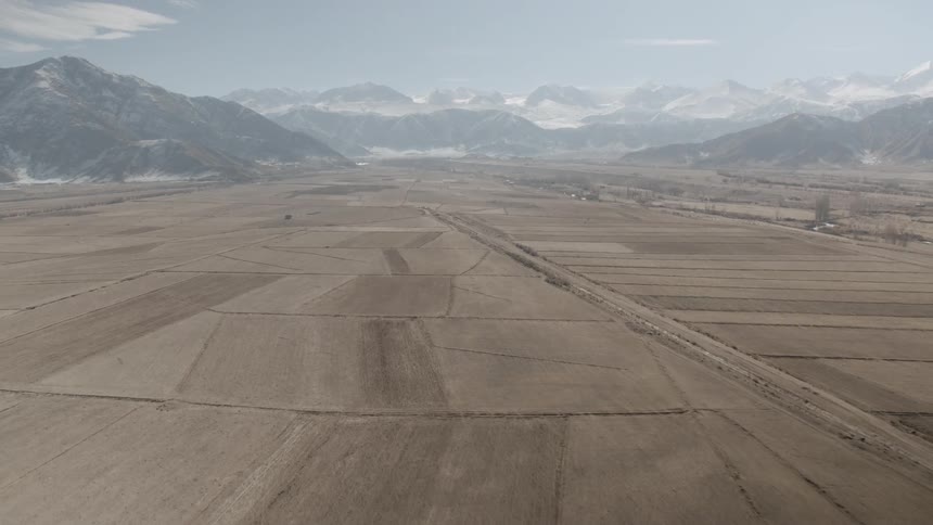 Outlines of crop fields on a wide flatland