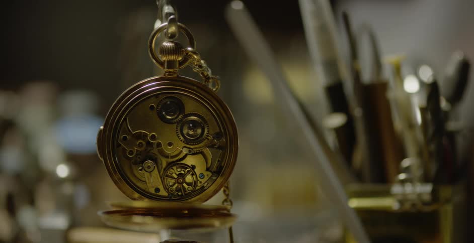 A pocket watch is spinning its gears