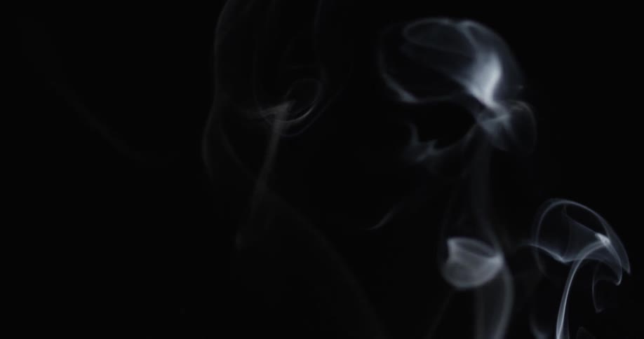 Smoke is swirling as it drifts up in the air