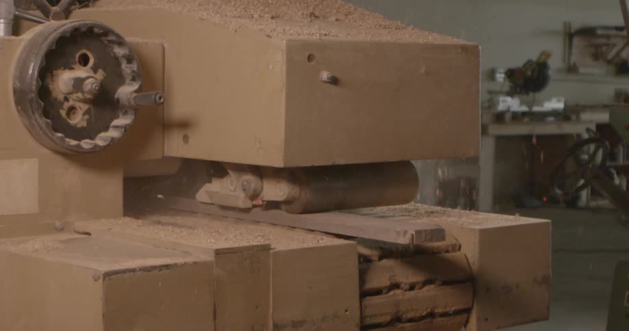 A machine is pressing sand
