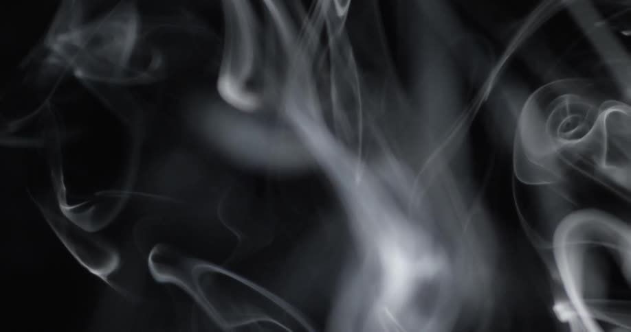 White smoke bellows into the air