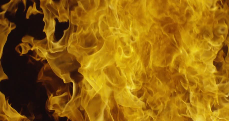 Flames are growing against a black background