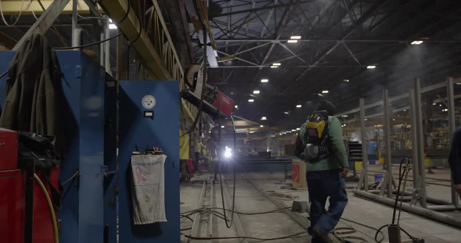 Welders work in a factory