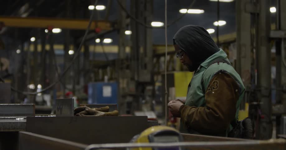 A man works in a factory