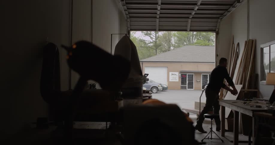 Someone is using a table saw to cut wood