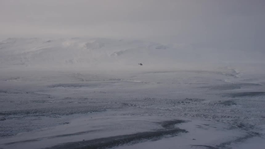 View of snowy plains on an overcast day
