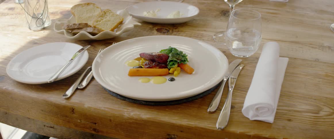 The plate is set neatly with a nice meal