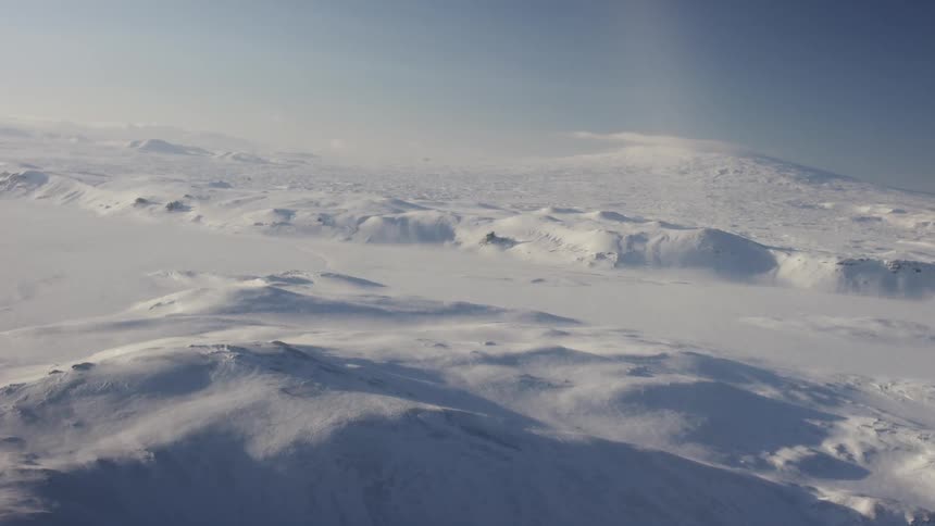 Aerial view of snow-covered mountain tops
