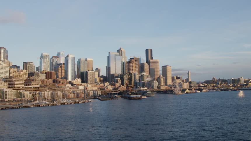Flying low above Elliott Bay toward downtown Seattle
