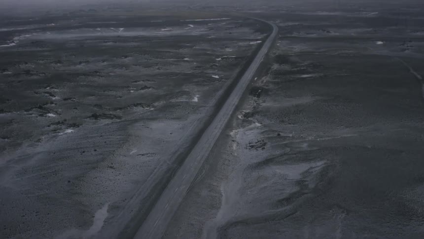A road runs through a rural area