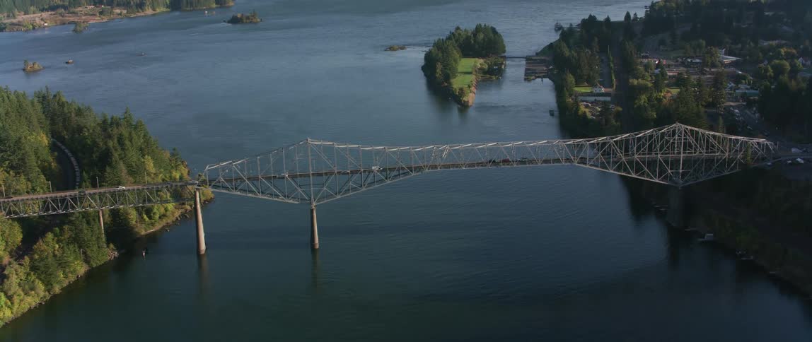 Traffic moves across a bridge spanning the canal