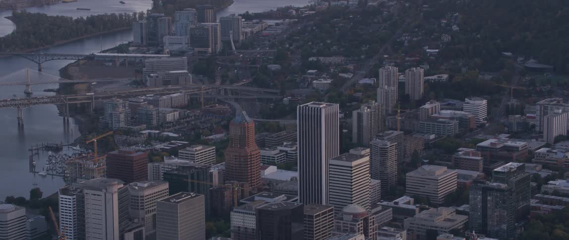 Tall city buildings tower into the skyline