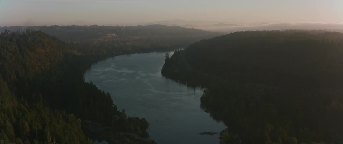 River winding through some wilderness near sunset