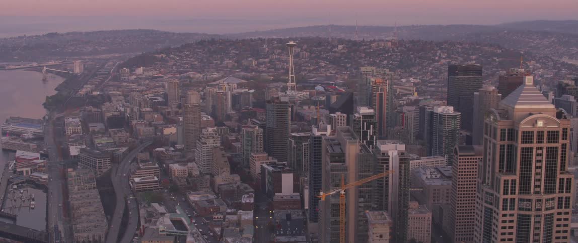 Looking out at the many skyscrapers with the space needle in the distance