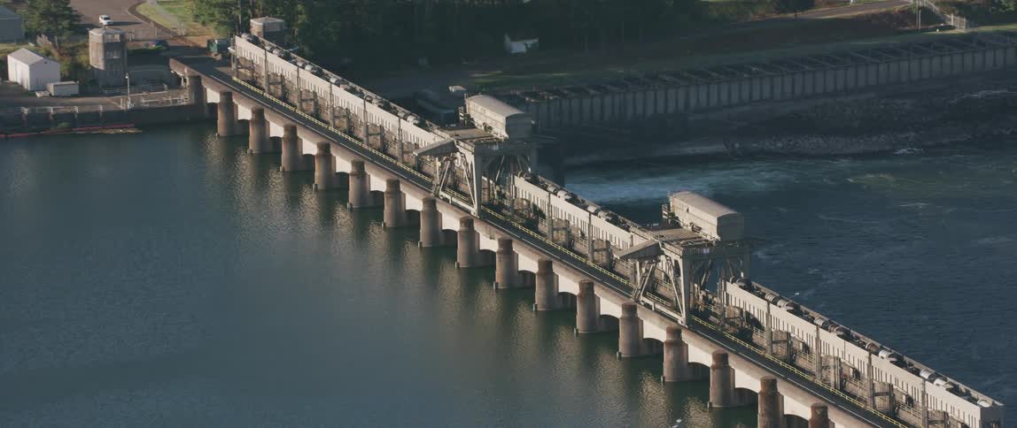A dam stretches across the waterway