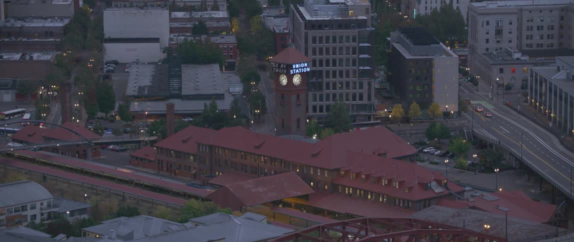 The sign on a station clock tower flashes on and off
