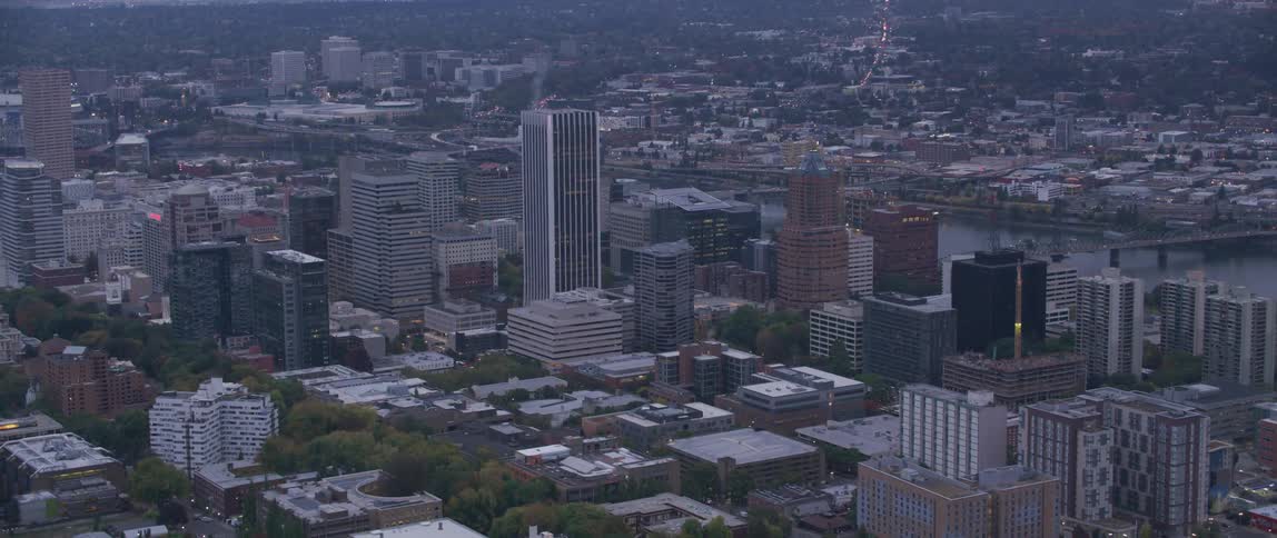 Tall city buildings tower into the skyline
