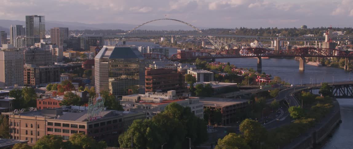 Large area of buildings with a river flowing through them