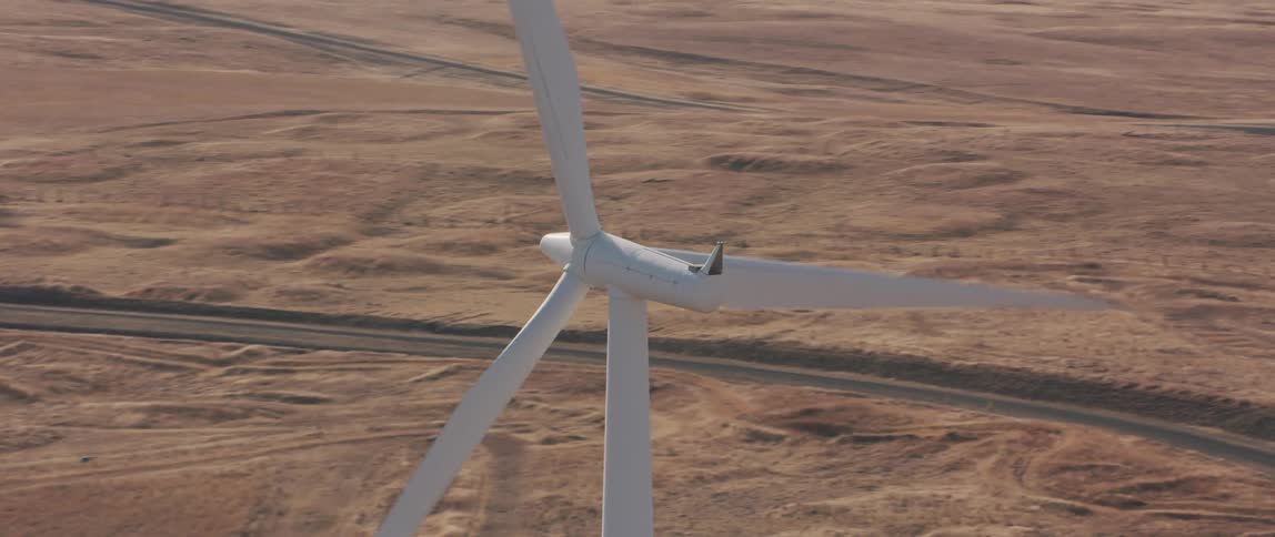 A windmill spins in the breeze