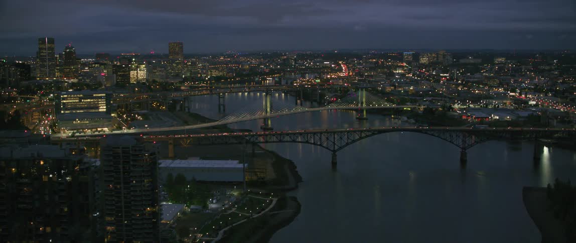The city lights sparkle at dusk