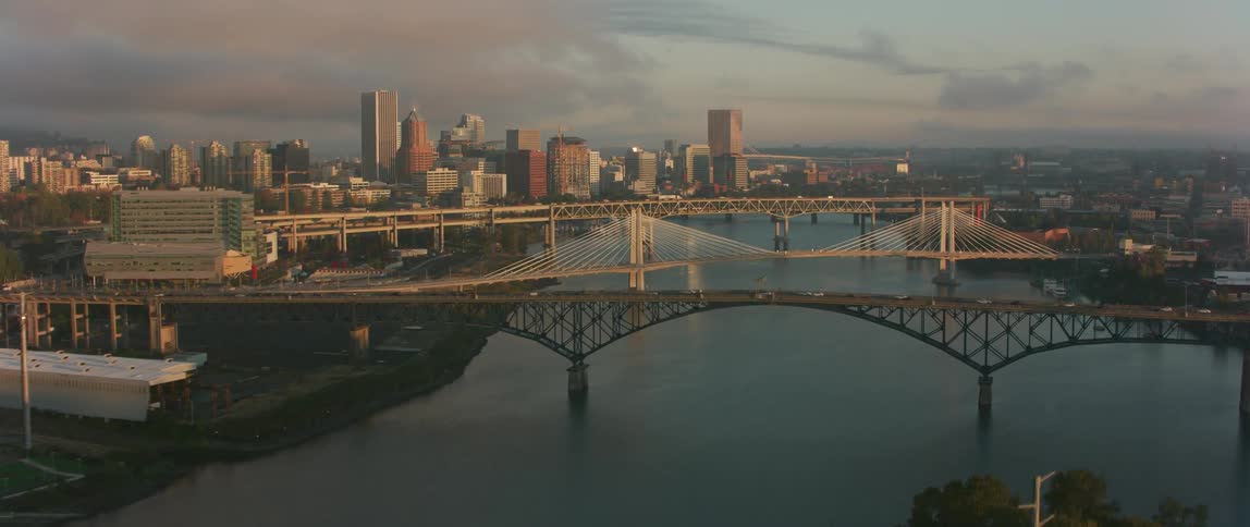 City bridges stretch across the water