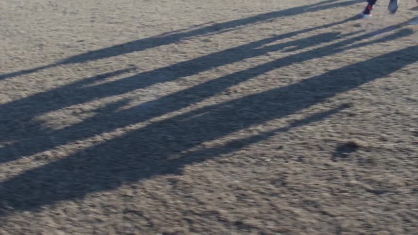 The children are playing a game of soccer