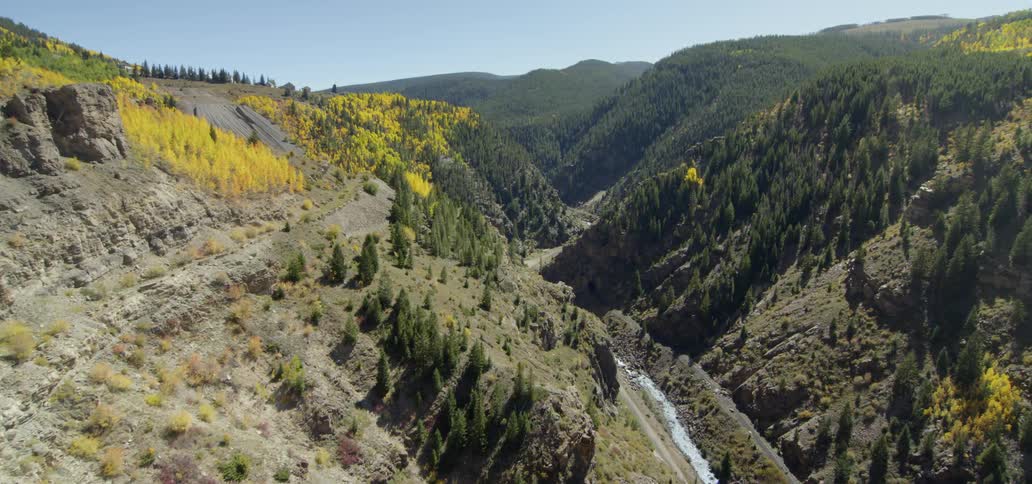 The hills of this valley are covered with trees