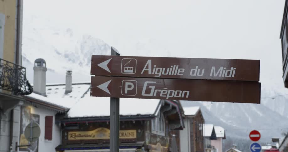 Street signs in a snowy town