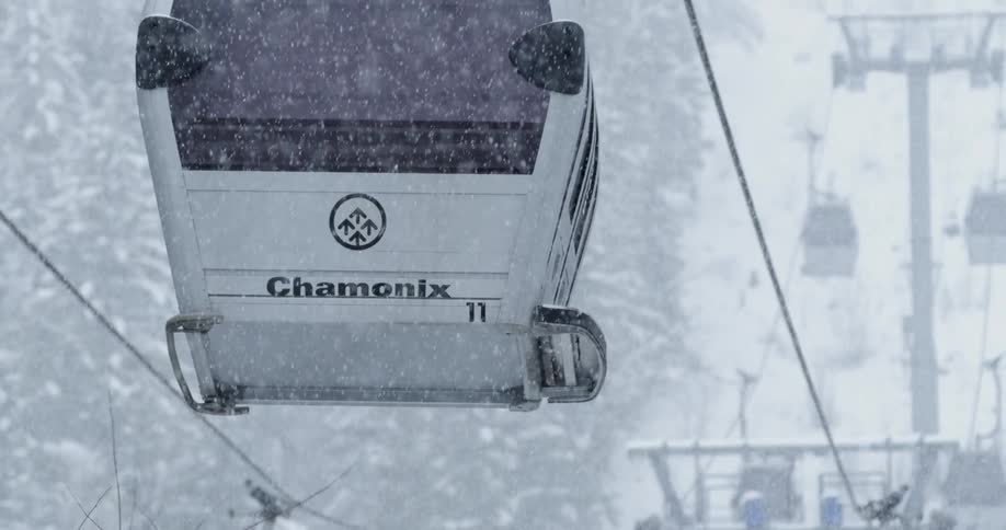 The ski lift slowly moves up into the air
